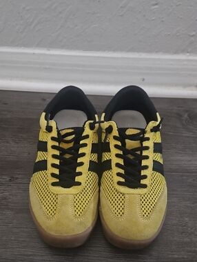 Adidas Women’s Yellow Athletic Sneakers with Black Stripes